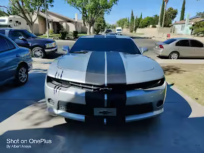 White sports car with dark window tint